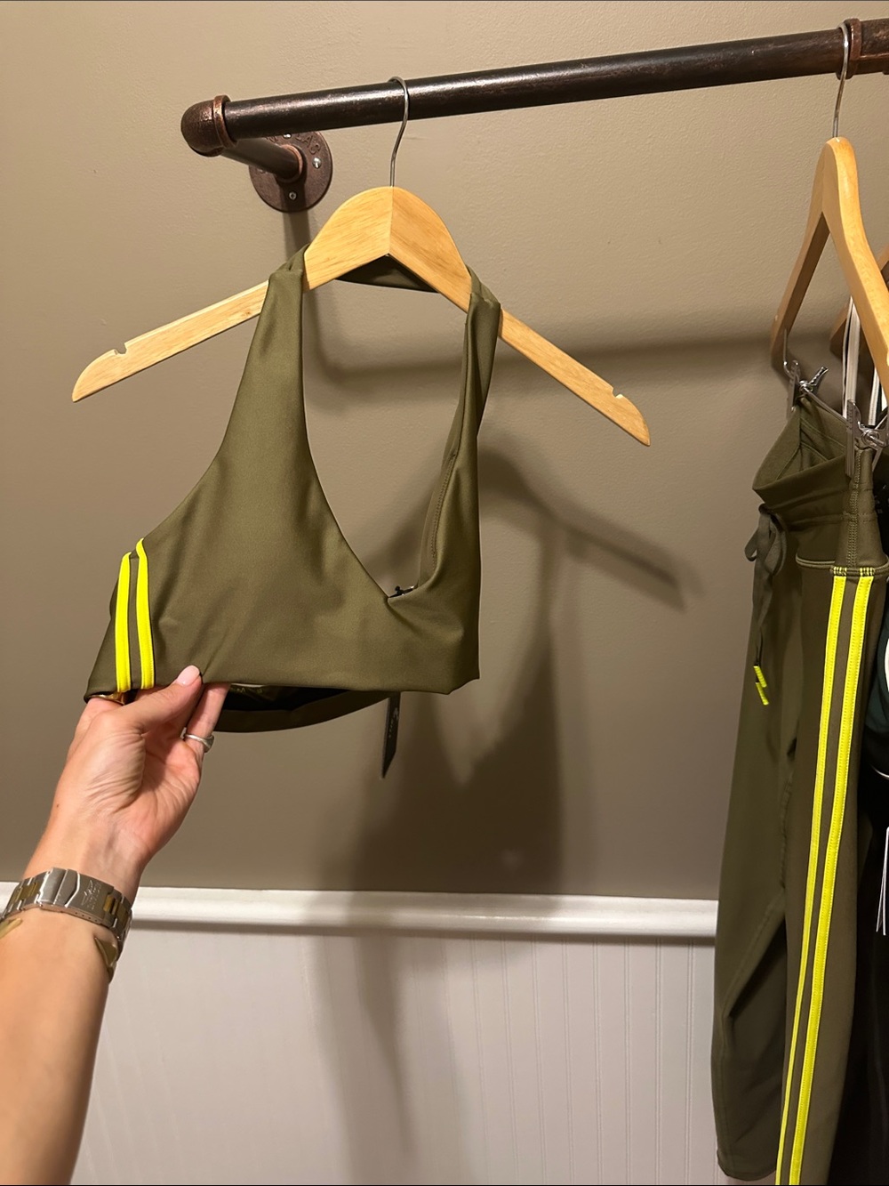 The Upside Olive Halter Sports Bra with Neon Yellow Stripes